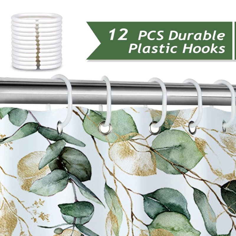Large eucalyptus shower curtain styled in elegant bathroom