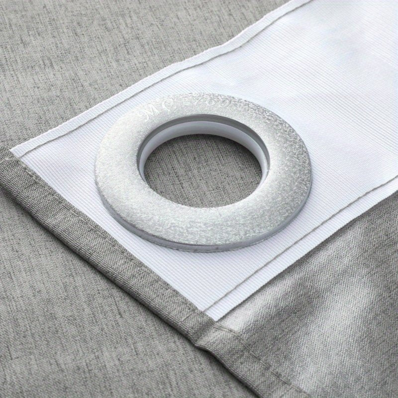 Advanced grey shower curtain styled in minimalist spa bathroom