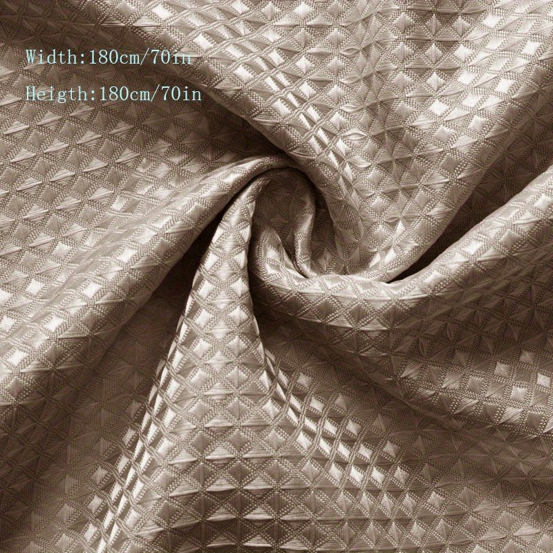 Close-up of jacquard waffle weave on khaki shower curtain