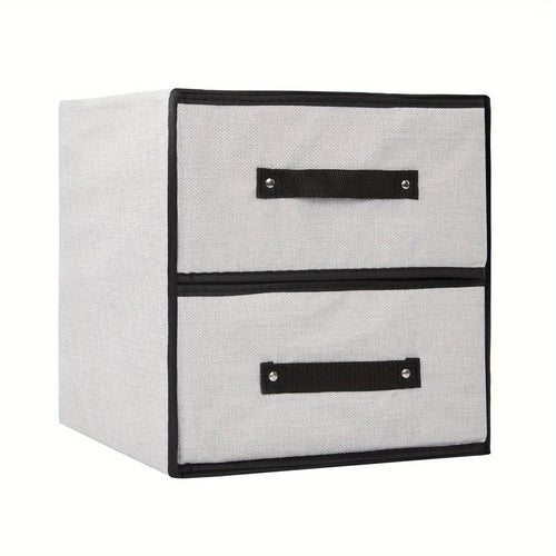 Fabric storage drawers pulled open showing folded clothes