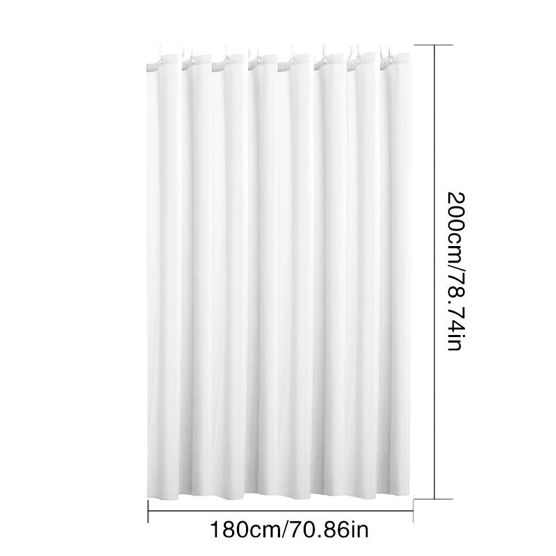 Black extra long shower curtain hanging straight over bath