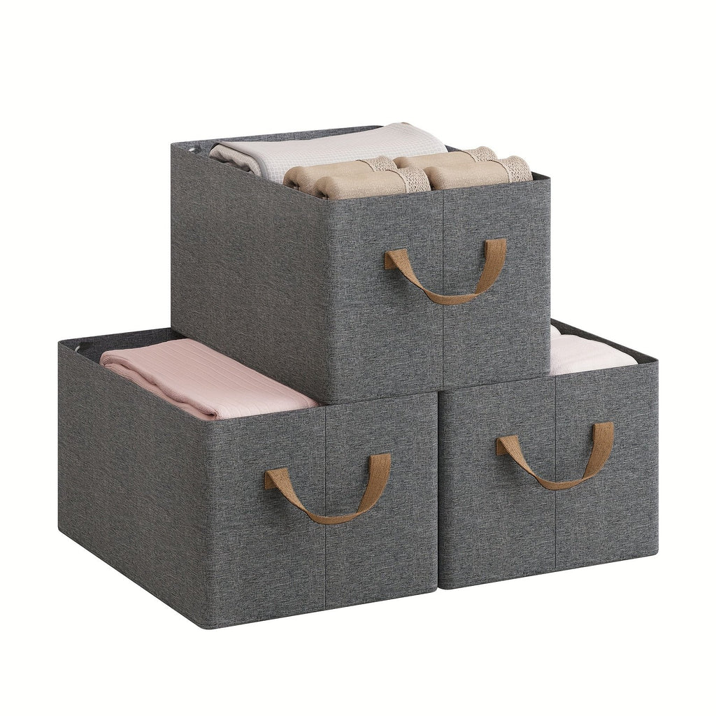 Stacking storage boxes arranged on shelf in modern grey