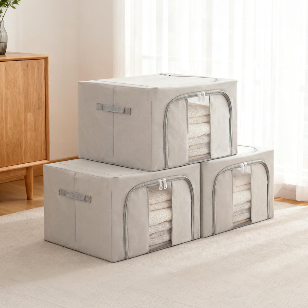 Foldable zippered storage box organising seasonal wardrobe items