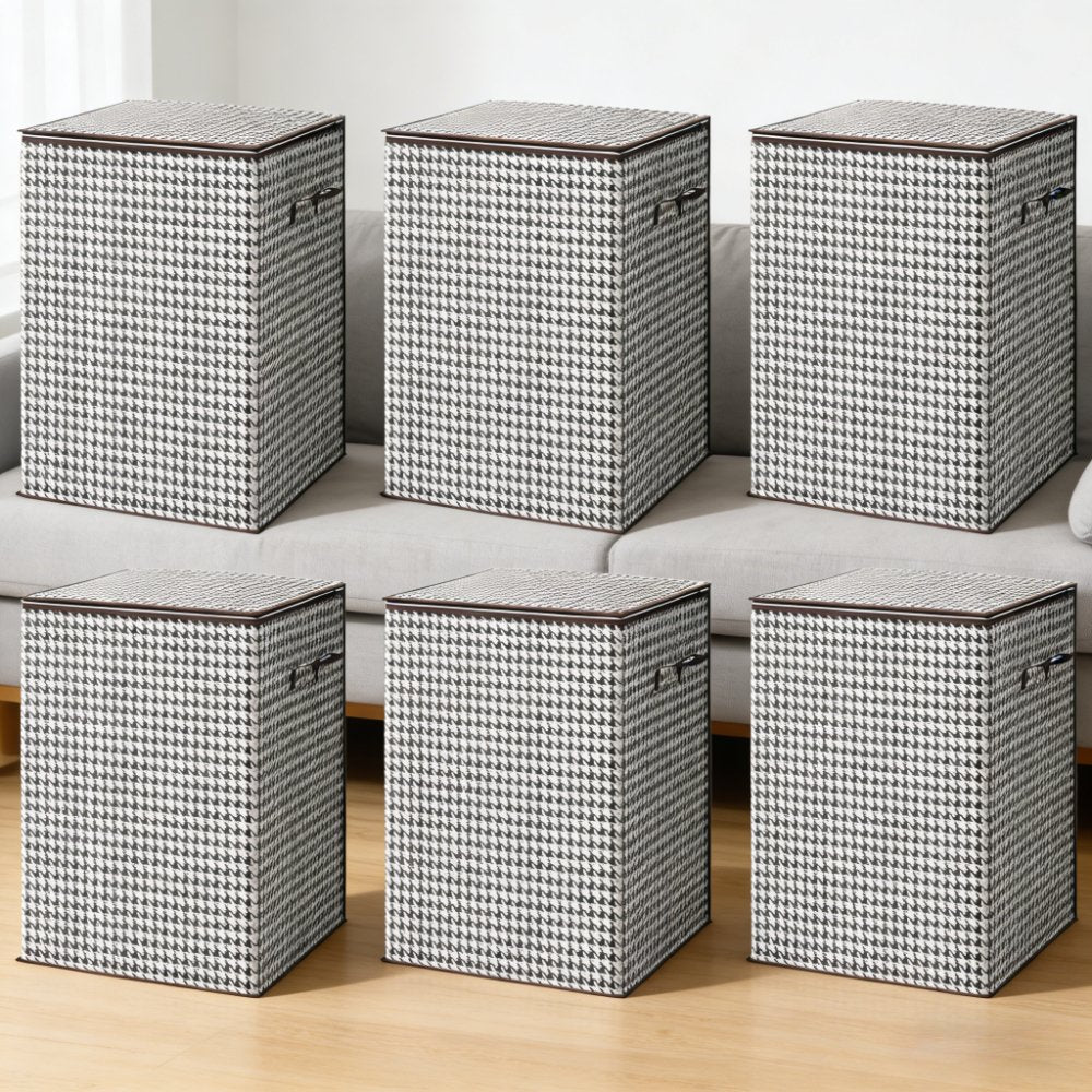 Extra large houndstooth fabric storage trunk holding folded clothes and bedding