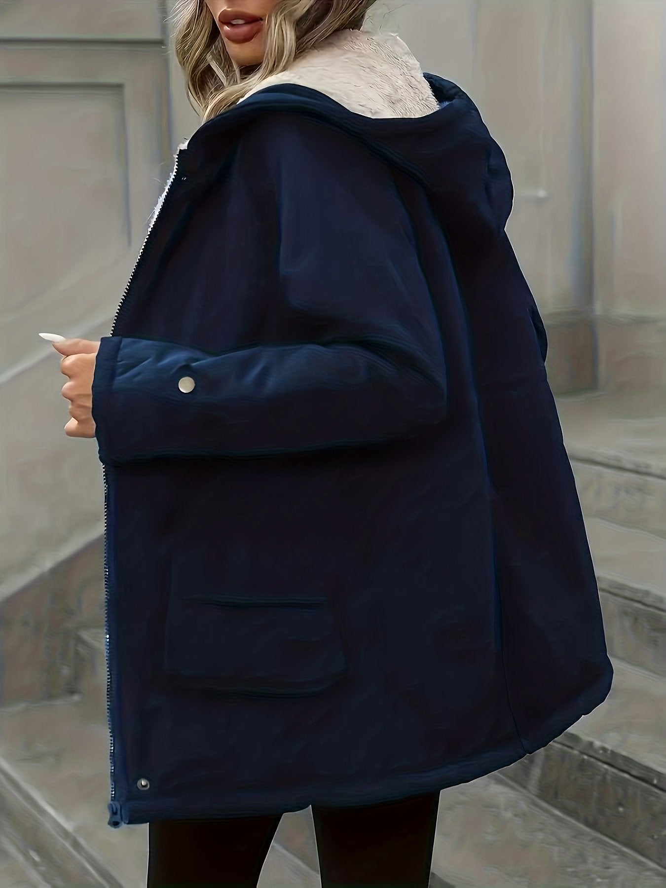Close-up of the zip and collar on the women's windbreaker jacket
