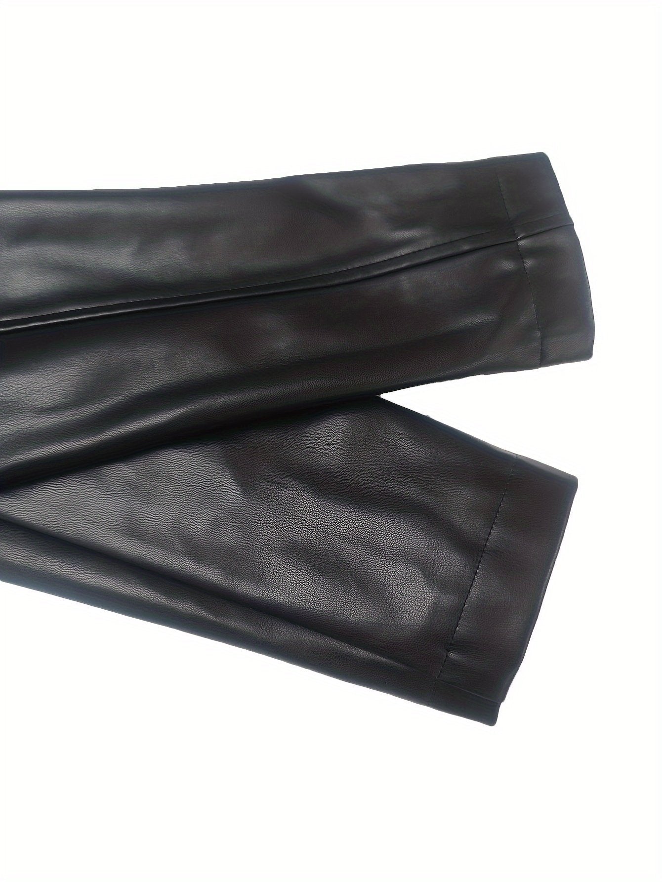 Zip detail on the women's black faux leather jacket