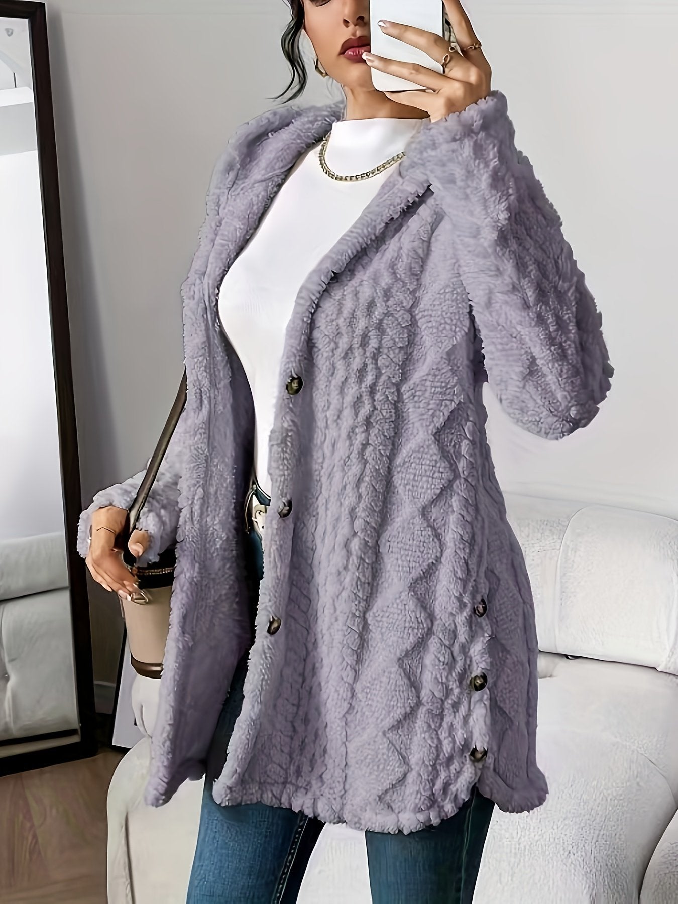 Brown jacquard plush coat for women styled with the hood down