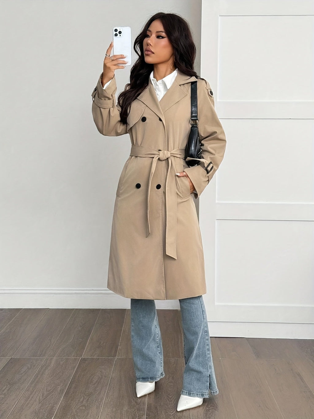Back view of the women's belted khaki winter trench coat