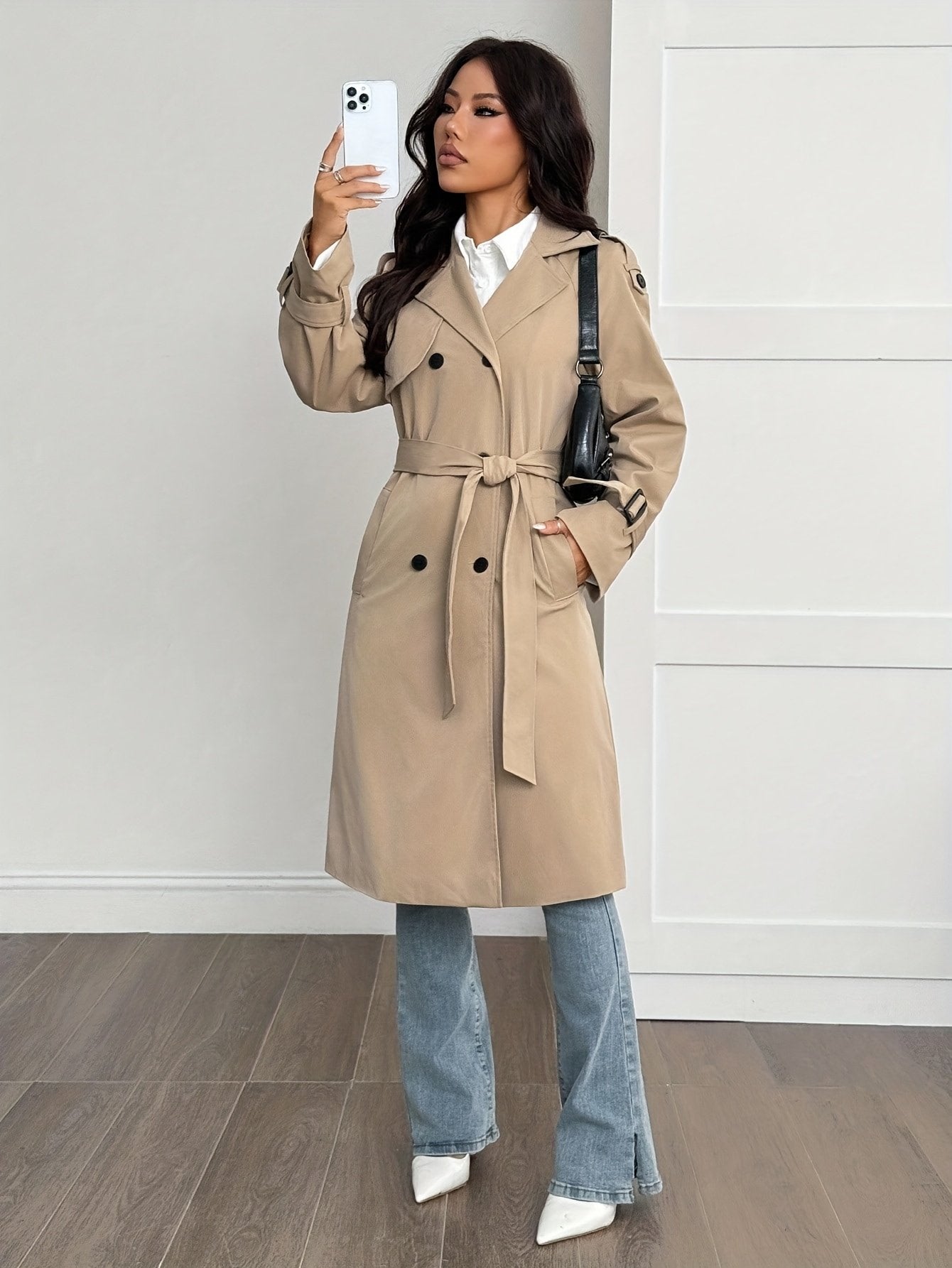Back view of the women's belted khaki winter trench coat