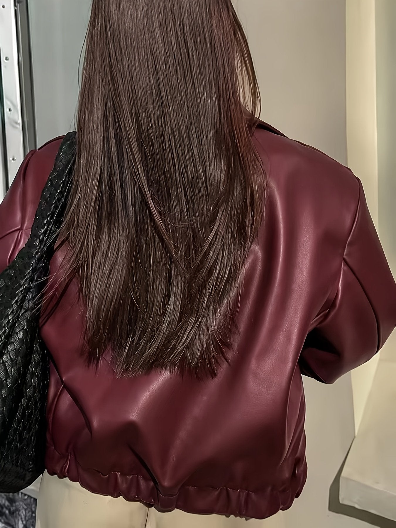 Zip detail on the women's burgundy PU leather jacket