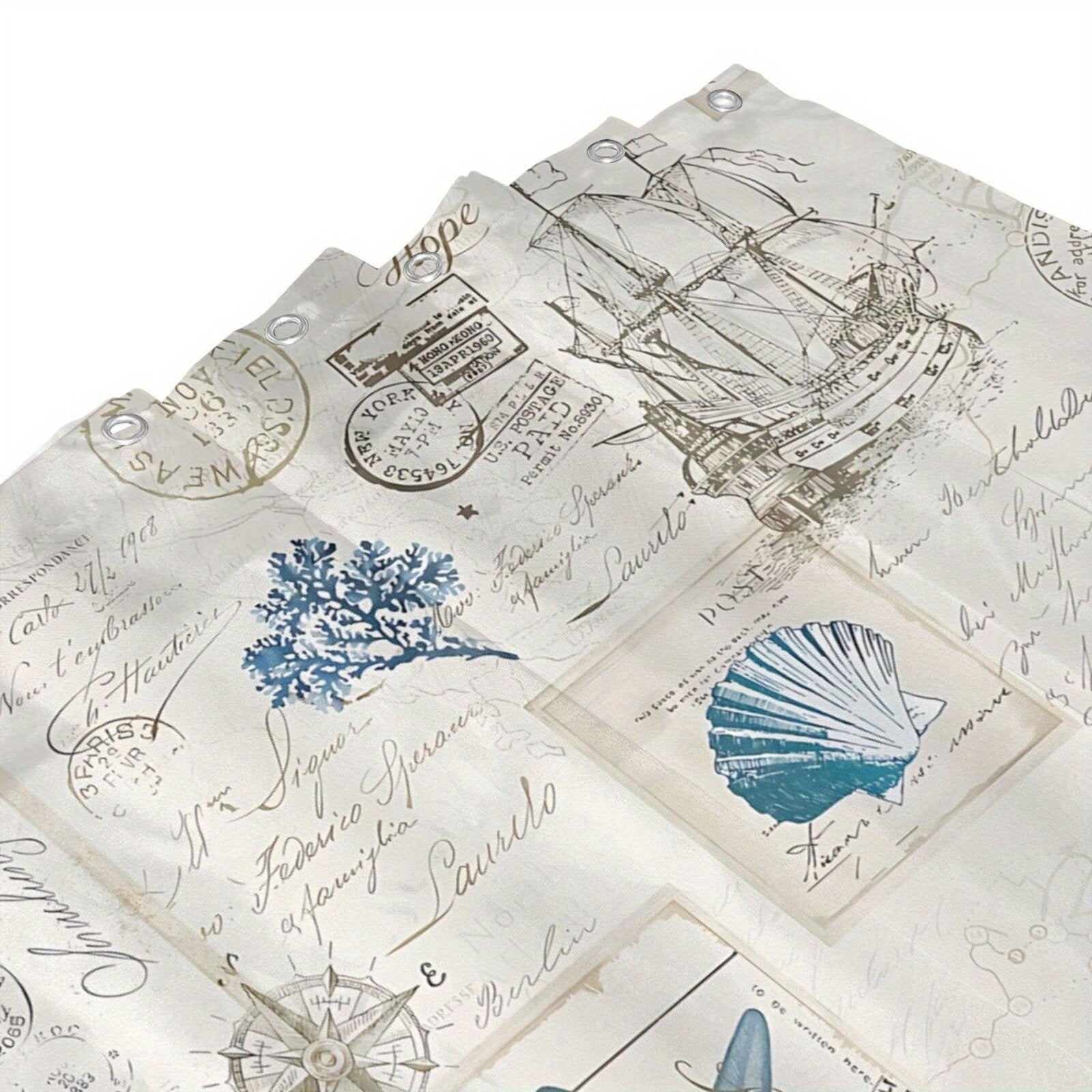 Blue and white nautical shower curtain hanging over bathtub