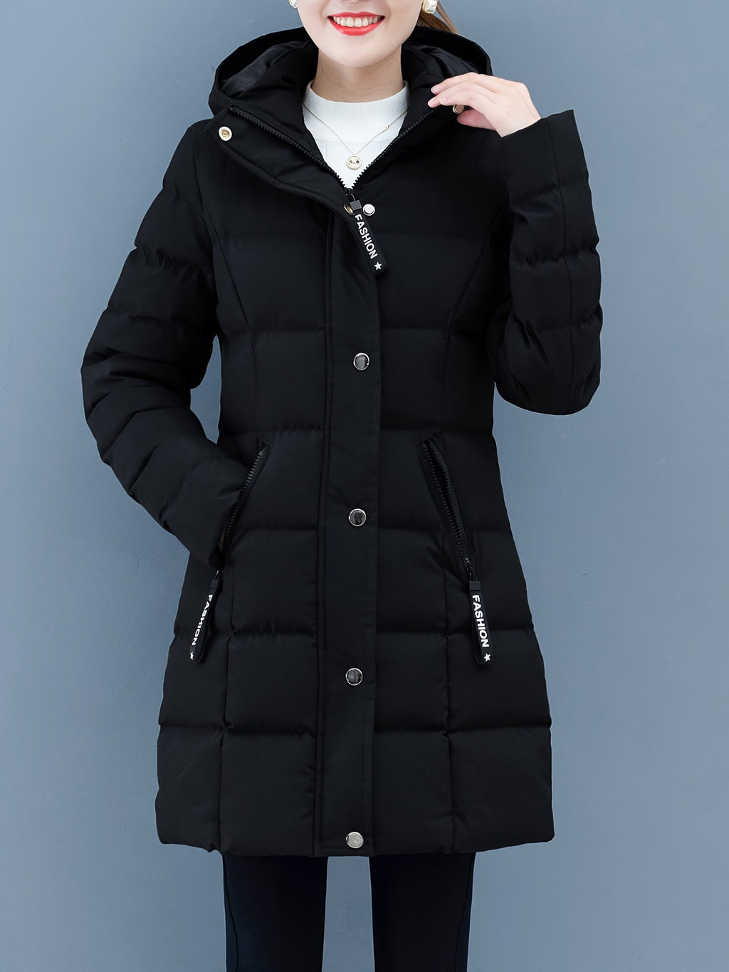 Close-up of the zipped pocket on the women's padded jacket