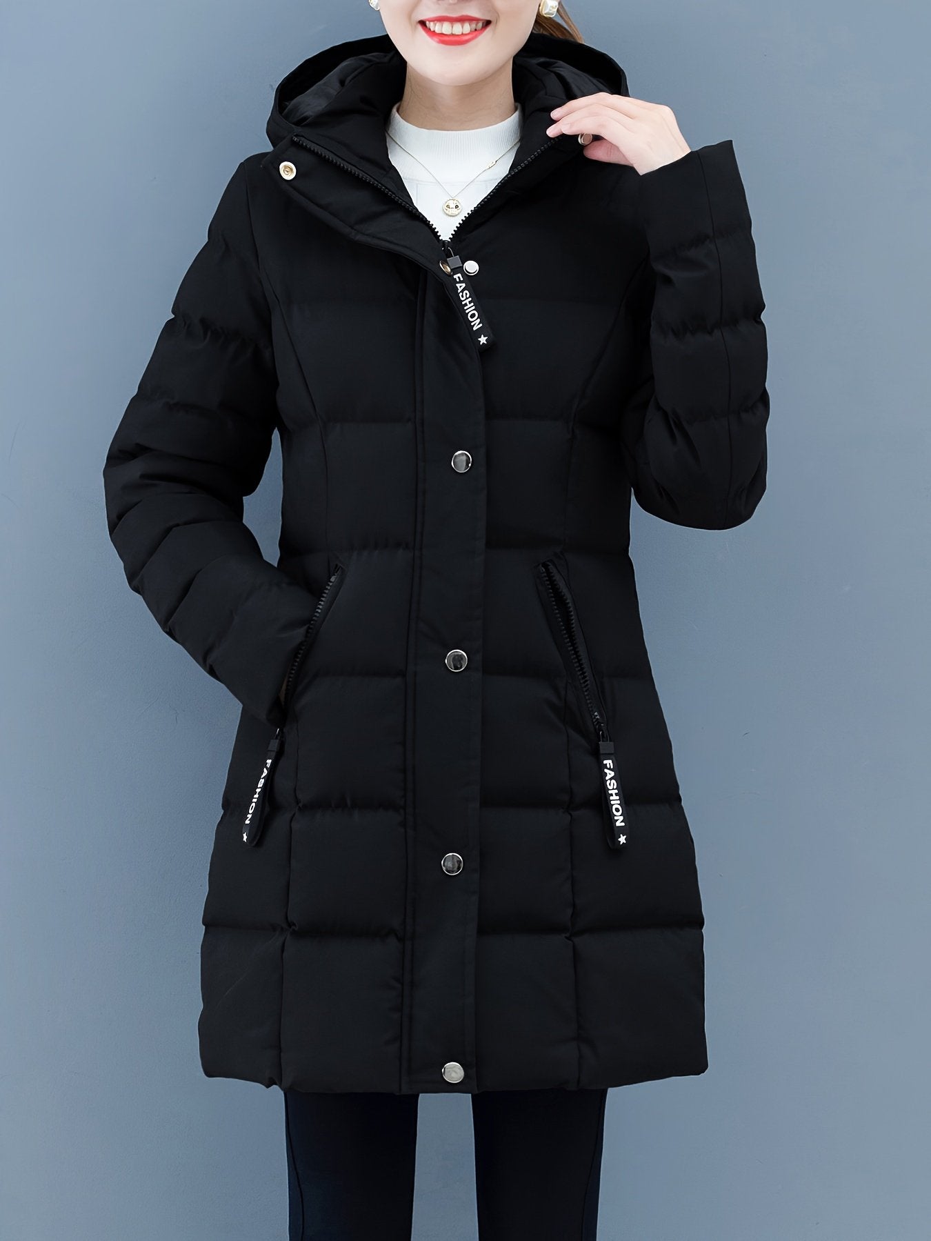 Close-up of the zipped pocket on the women's padded jacket