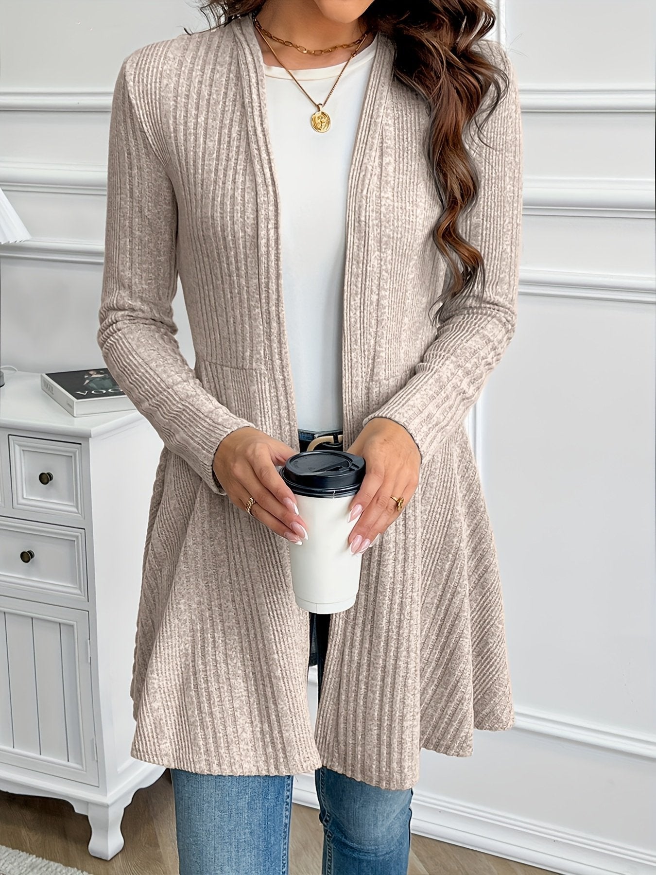Women's light grey collarless textured knit jacket, front view