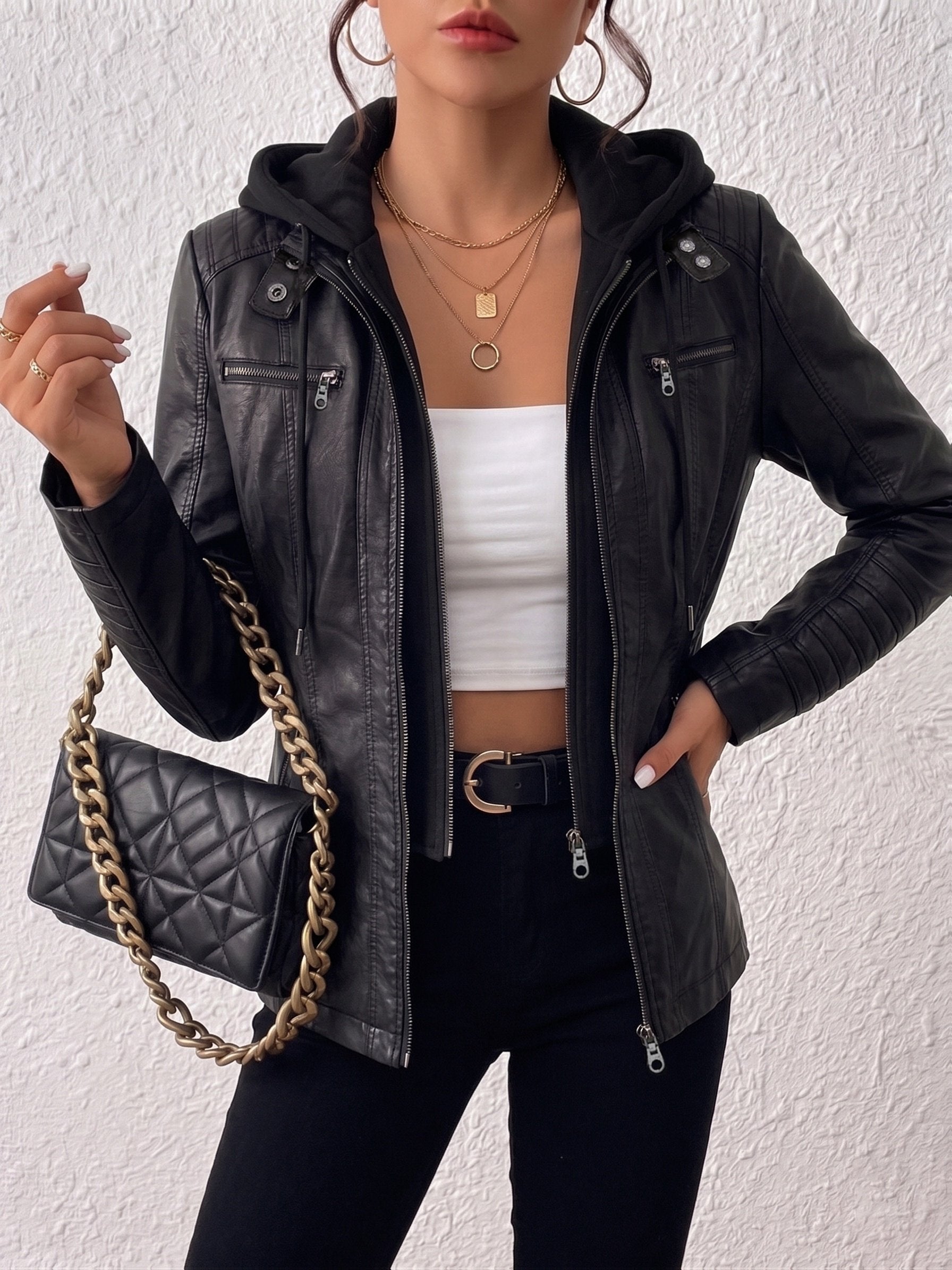 Multi-pocket detail on the women's slim fit moto jacket