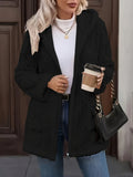 Back view of the women's black plush hooded zip-up coat