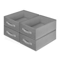 Grey and beige fabric storage cubes lined up on shelf