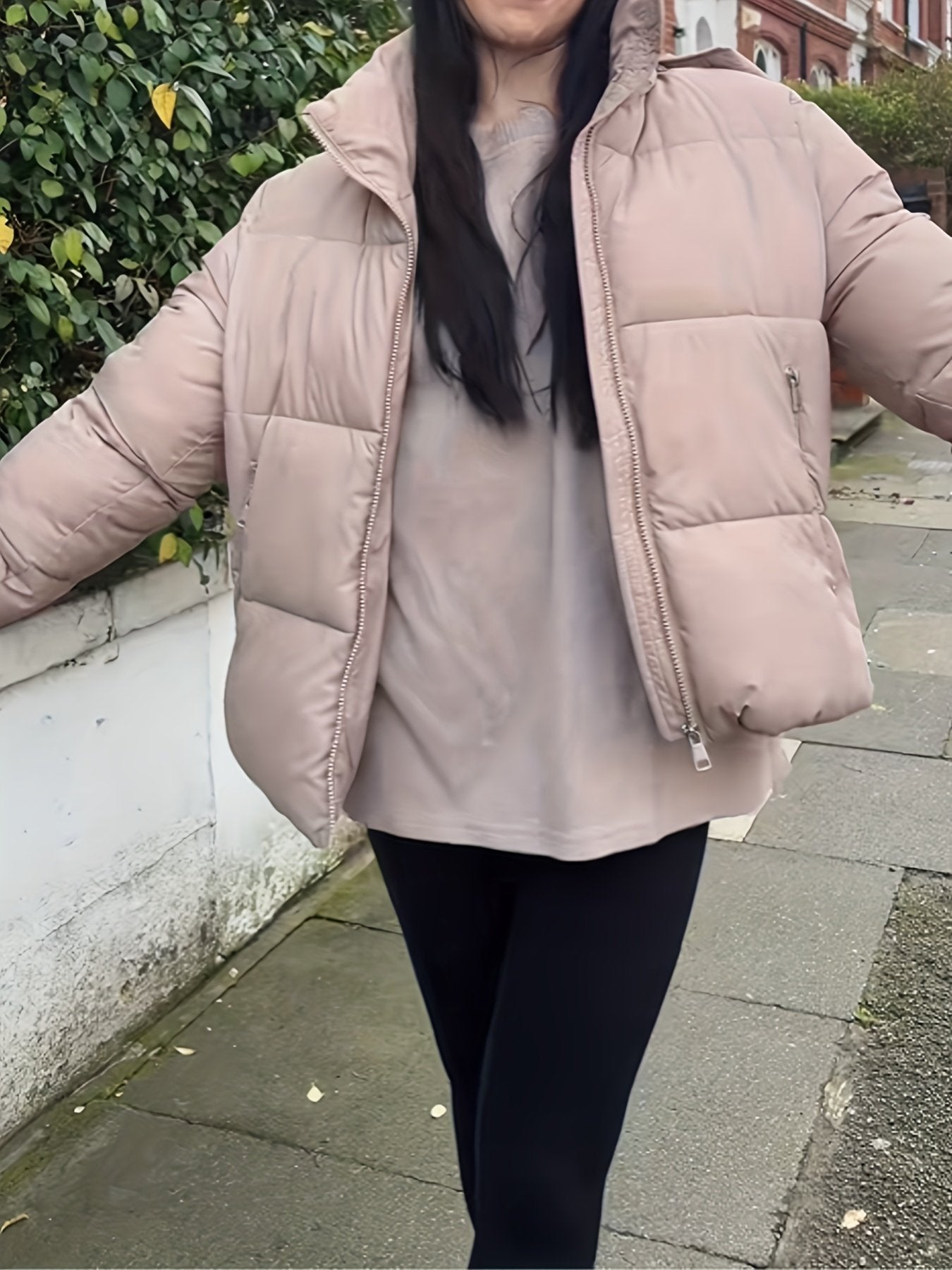Deep zip pocket detail on the women's padded winter coat