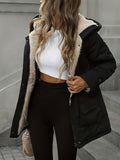 Hood detail on the women's black winter windbreaker