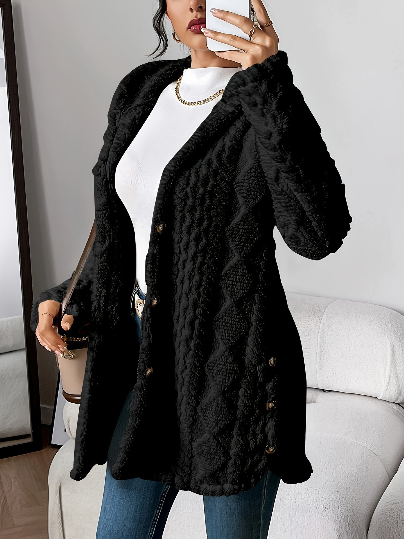 Side slit detail on the long plush hooded coat for women