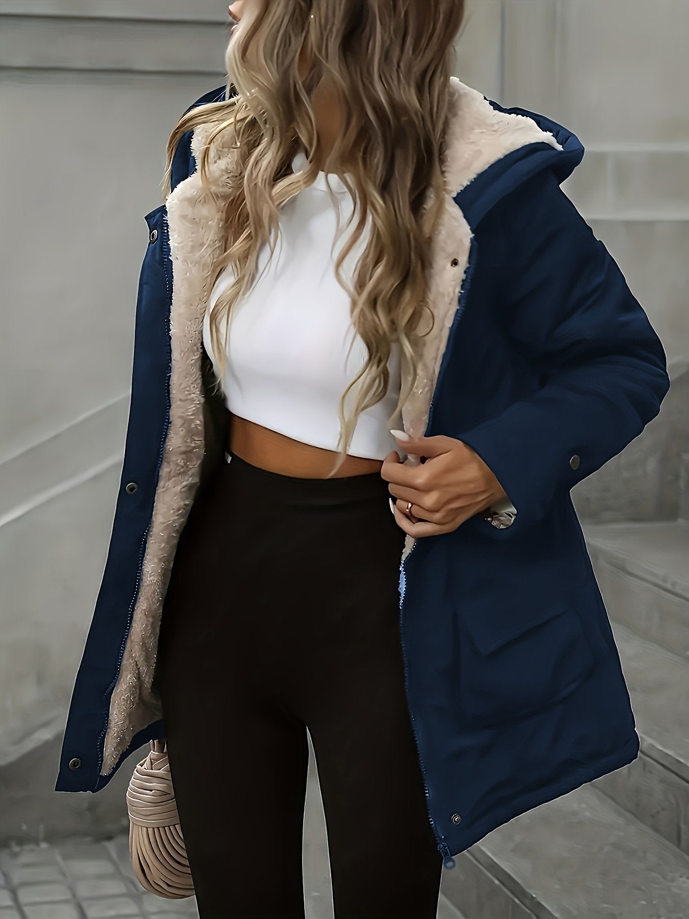 Cuff and hem detail on the women's wind-resistant jacket