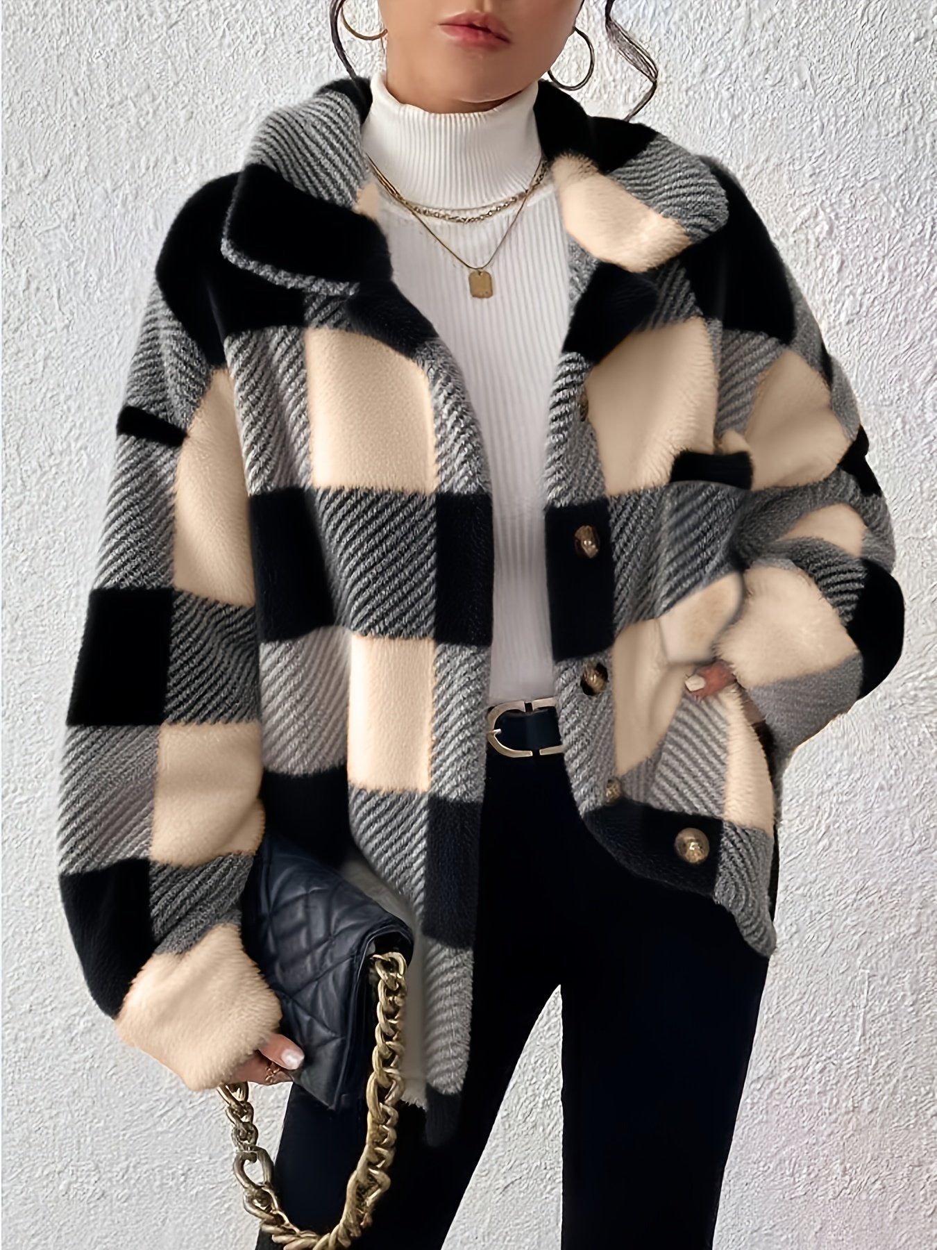 Button front detail on the women's checked plush winter jacket