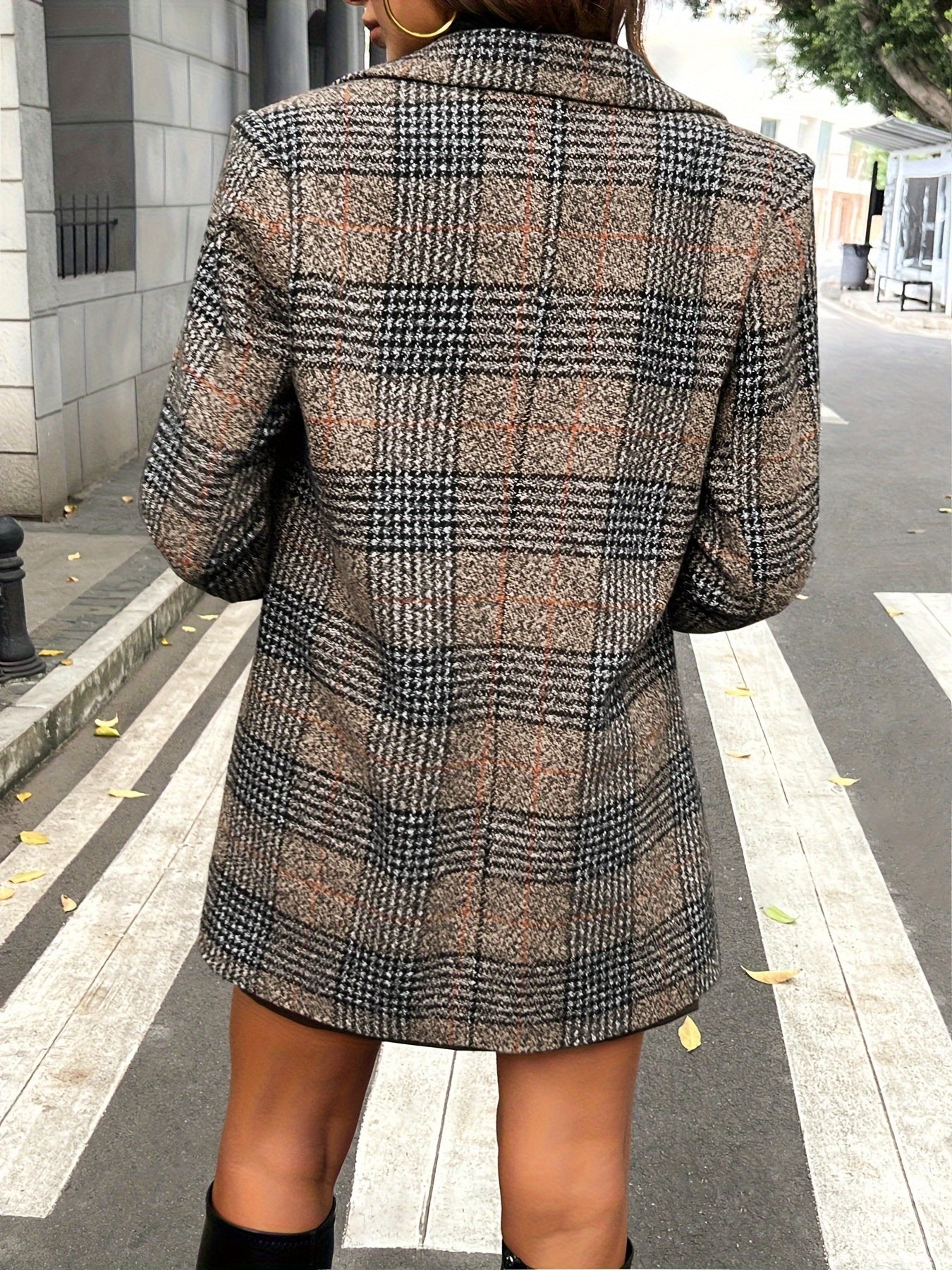 Side view of the slim cut on the women's plaid trench coat