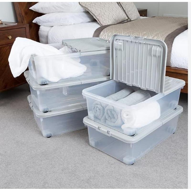 32 litre clear storage drawer with lid holding folded clothes and bedding
