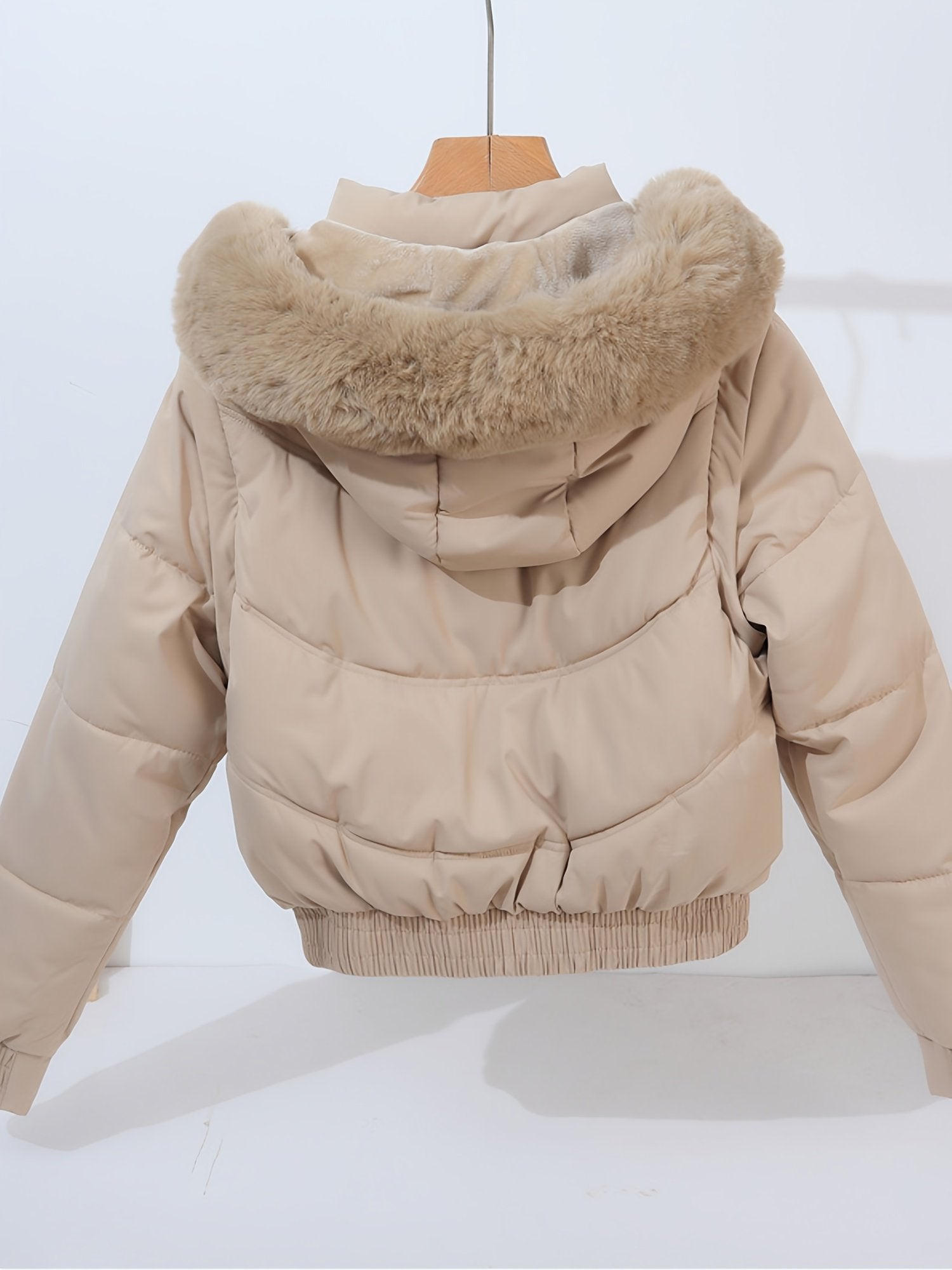 Close-up of the sleeve zip on the women's detachable sleeve coat