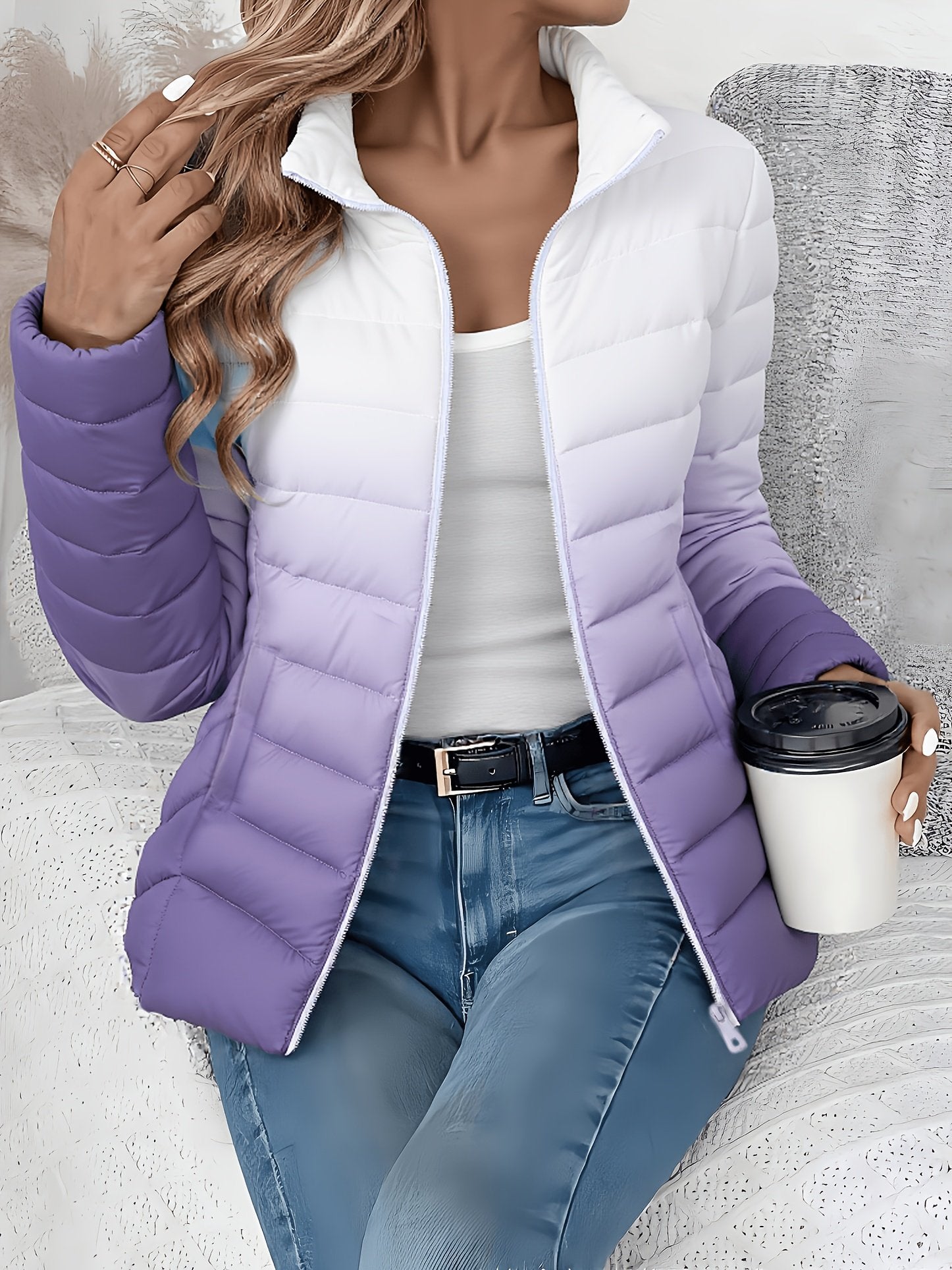 Side view of the slim cropped fit on the women's quilted jacket